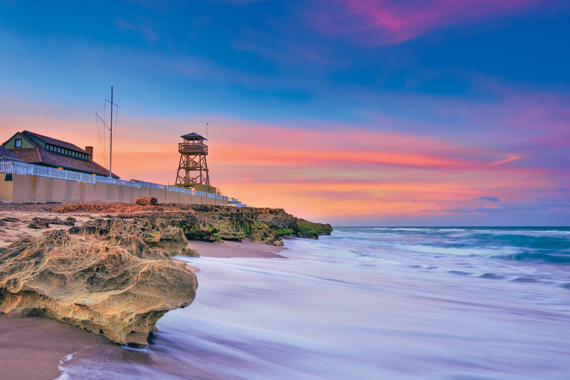 Sunset over the rocks in Stuart, Florida — Yareli's hometown on the Treasure Coast